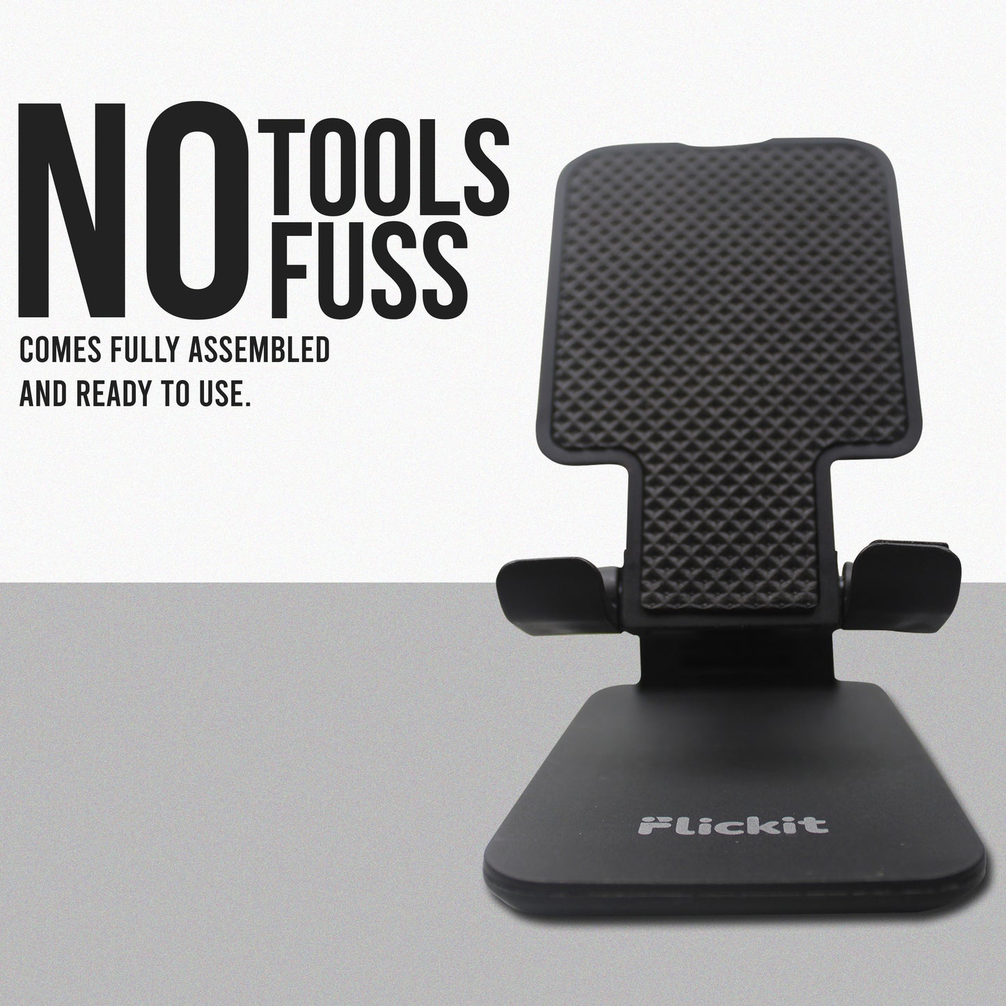 Black phone stand with 'Flickit' branding on a gray background, featuring text about assembly ease.