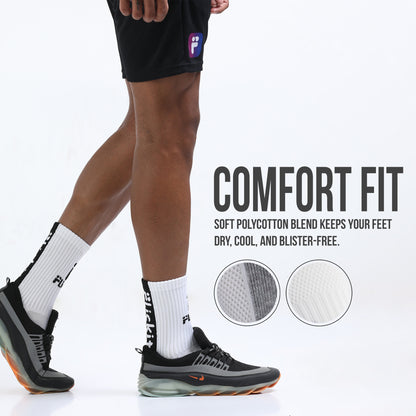 Person wearing black athletic shoes and white socks with text about comfort fit on a white background