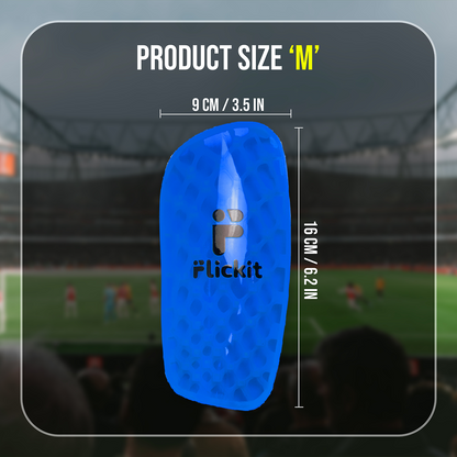 Blue protective pad with 'Flickit' branding and measurements on a blurred stadium background