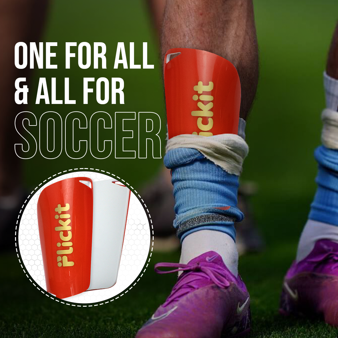 Soccer player wearing a red Flickit shin guard on a grass field with promotional text.
