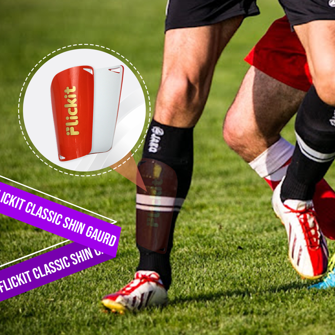 Person wearing a Flickit shin guard on a grassy field with product inset.